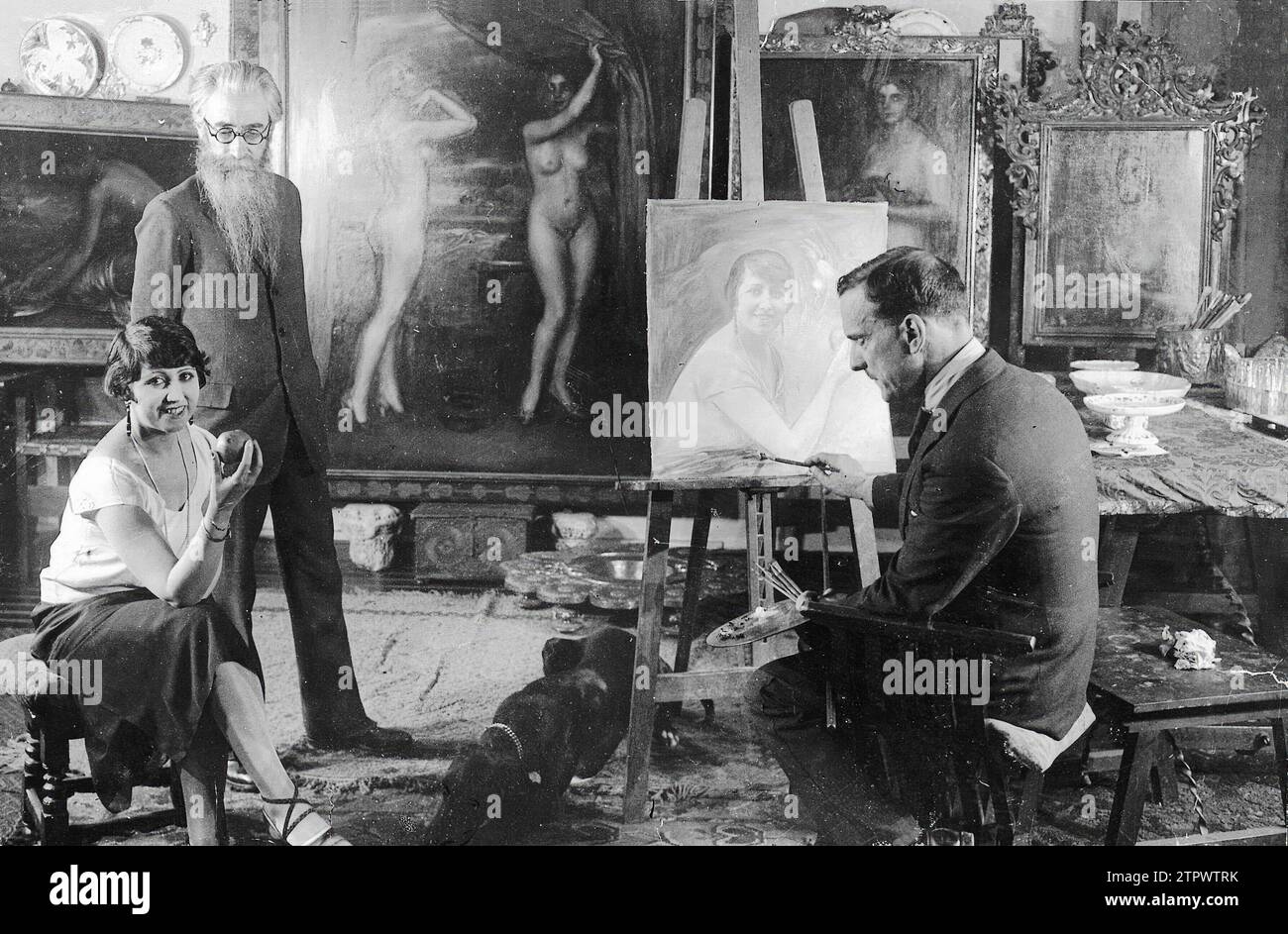 Madrid, 1926. Filming of 'La Malcasada'. In the image, Julio Romero de Torres, María Banquer and Ramón María del Valle-Inclán, pose in the painter's Madrid studio during filming. Credit: Album / Archivo ABC Stock Photo
