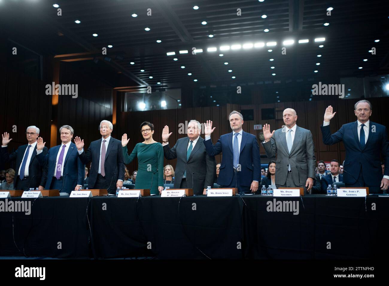 President and CEO of Wells Fargo & Company Charles Scharf, Chairman and CEO of Bank of America Brian Thomas Moynihan, Chairman and CEO of J.P. Morgan Chase & Co. Jamie Dimon, CEO of Citigroup Jan Fraser, CEO of State Street Ronald O'Hanley, CEO of BNY Mellon Robin Vince, CEO of Goldman Sachs David Solomon and CEO of Morgan Stanley James Gorman are sworn in during a Senate Banking, Housing and Urban Affairs committee oversight hearing examining Wall Street firms at the U.S. Capitol in Washington, DC, on Wednesday, December 6, 2023. Photo by Bonnie Cash/UPI Stock Photo