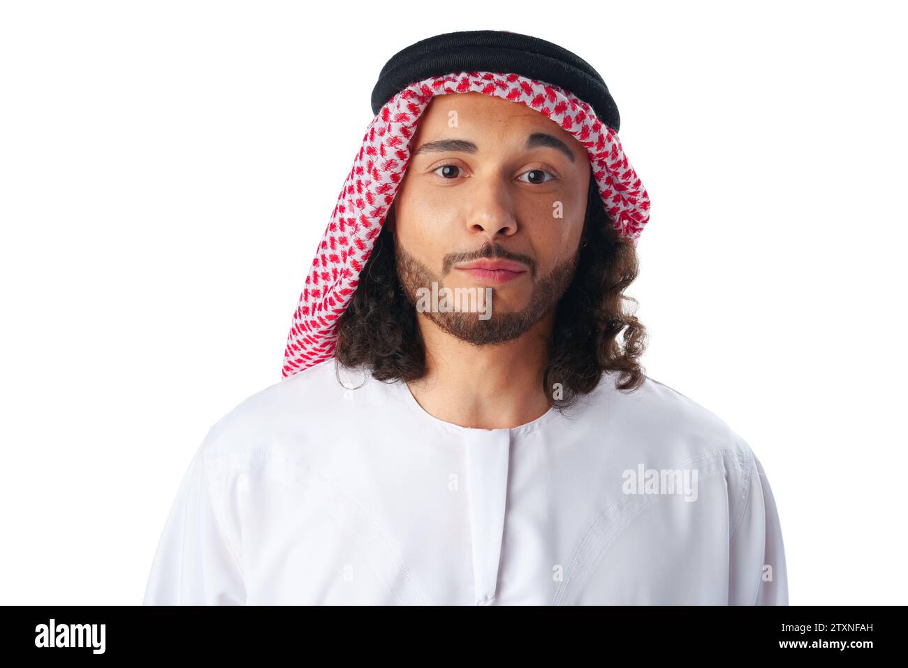 Portrait of a young Arab man wearing middle-eastern traditional dress thobe isolated on white Stock Photo