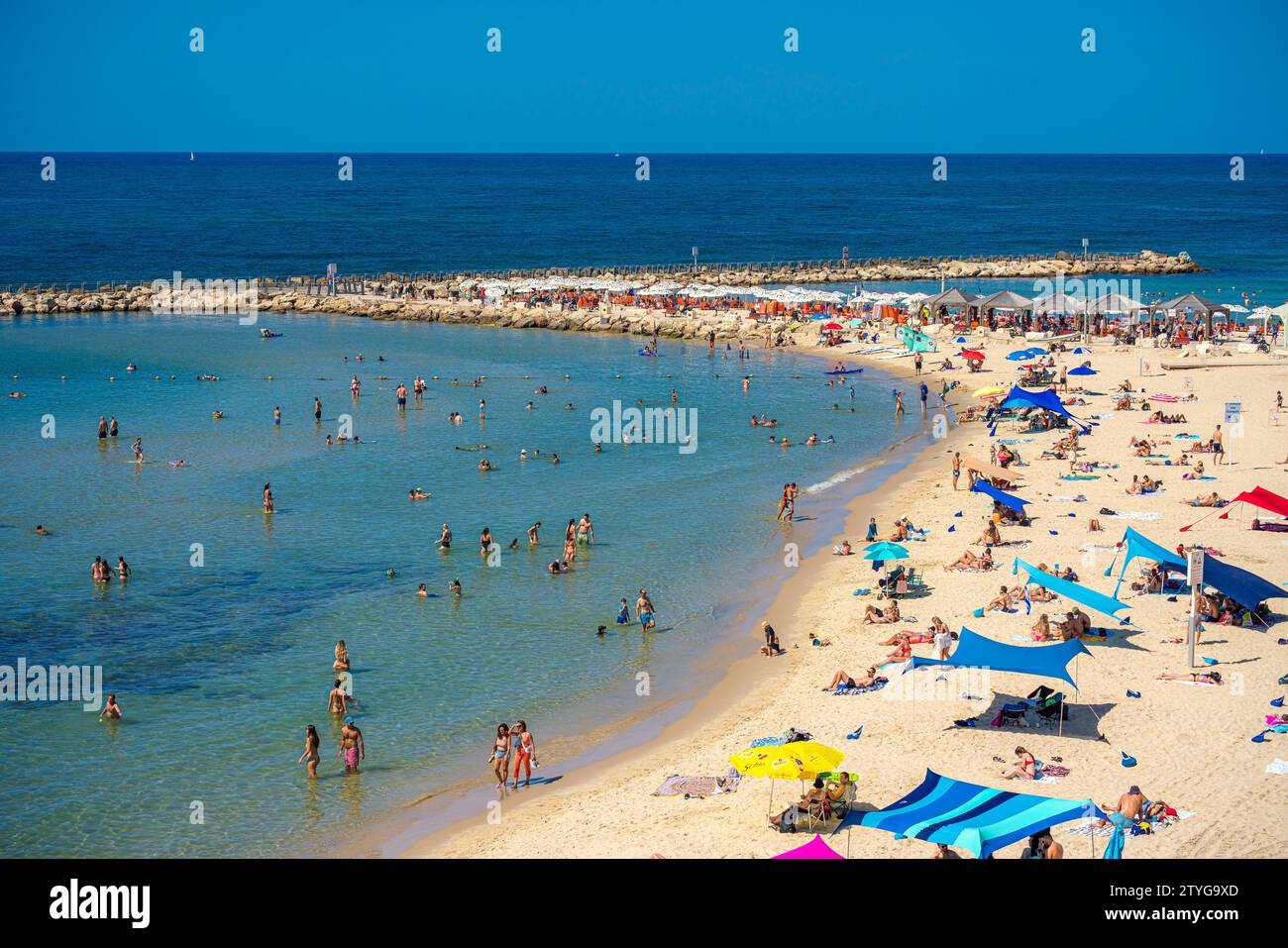 Tel Aviv, Israel. September 30, 2023. People enjoy a warm day at the beach Stock Photo