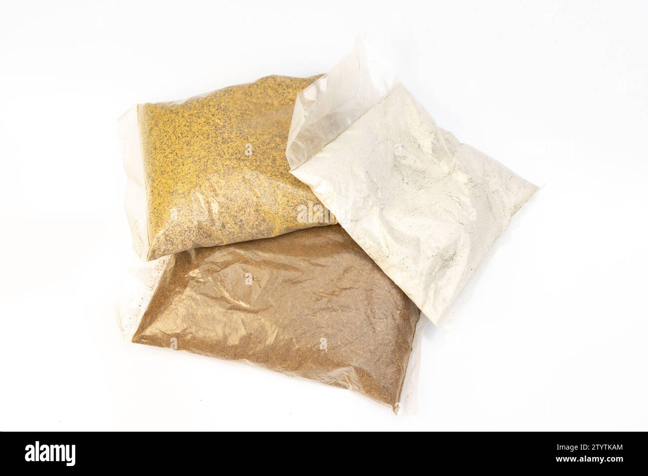 Organic fertilizer bonemeal, mustard cake and neem fertilizers isolated on white background Stock Photo