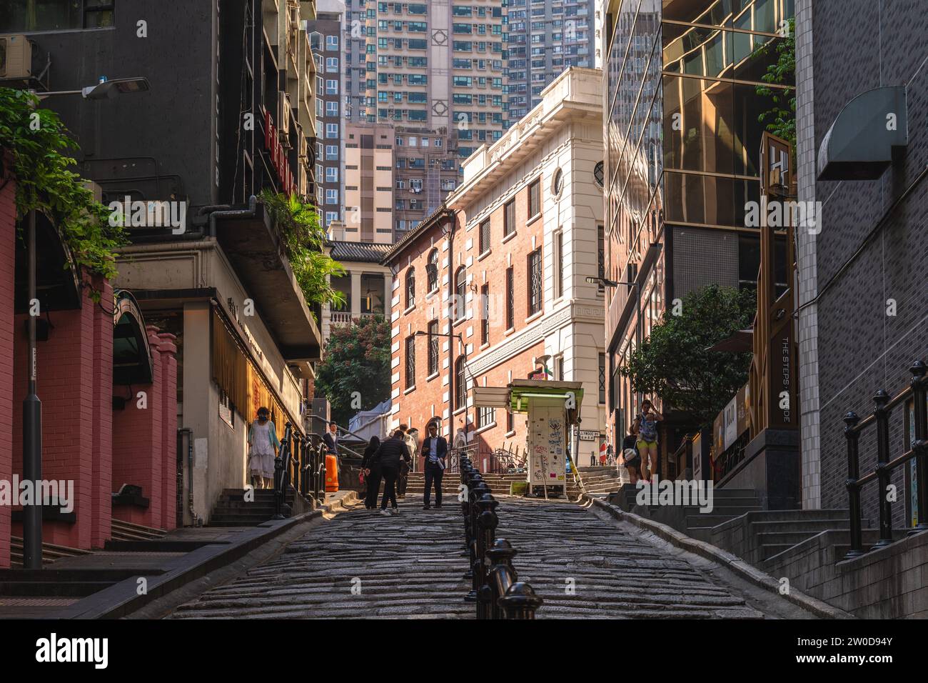 December 12, 2023: Pottinger Street, aka the Stone Slabs Street, is a street paved unevenly by granite stone steps in Central, Hong Kong.  It was name Stock Photo