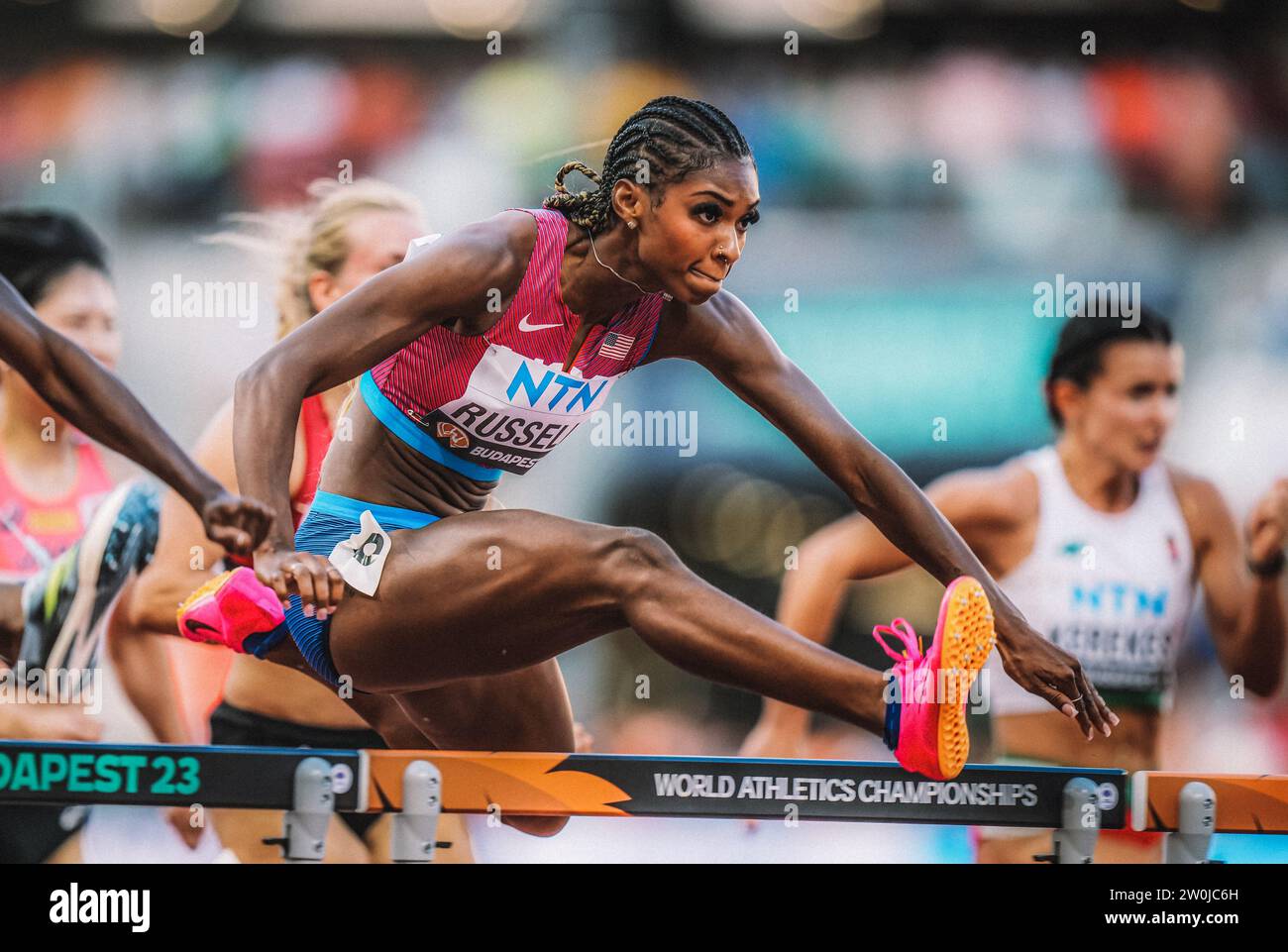 Masai Russell participating at the World Athletics Championships in