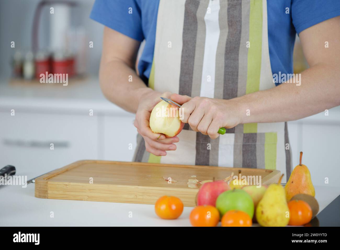 peeling apples Stock Photo