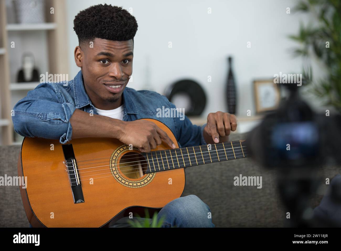 handsome man recording song - vlogging concept Stock Photo