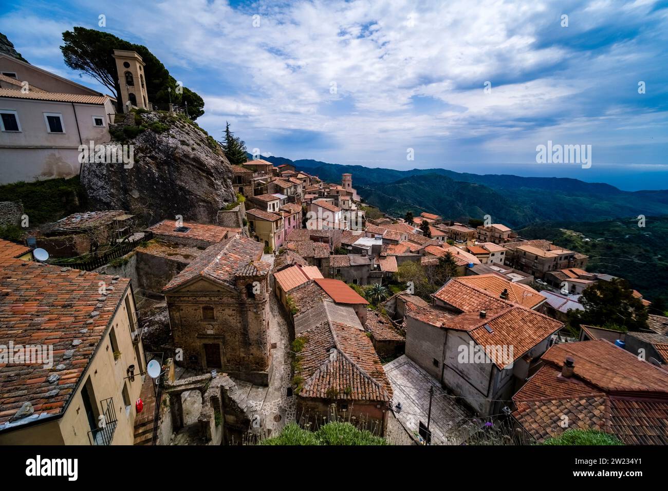 Aerial view on the roofs of the small town of Bova, situated on top of a wooded hill. Stock Photo