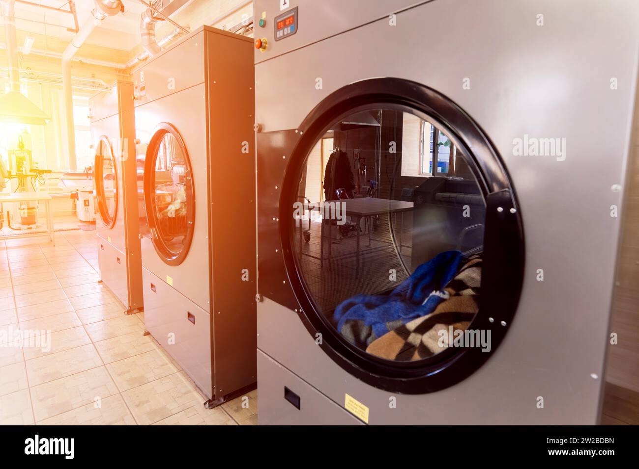 Line of laundry machine, washing machines. Automate equipment Stock ...