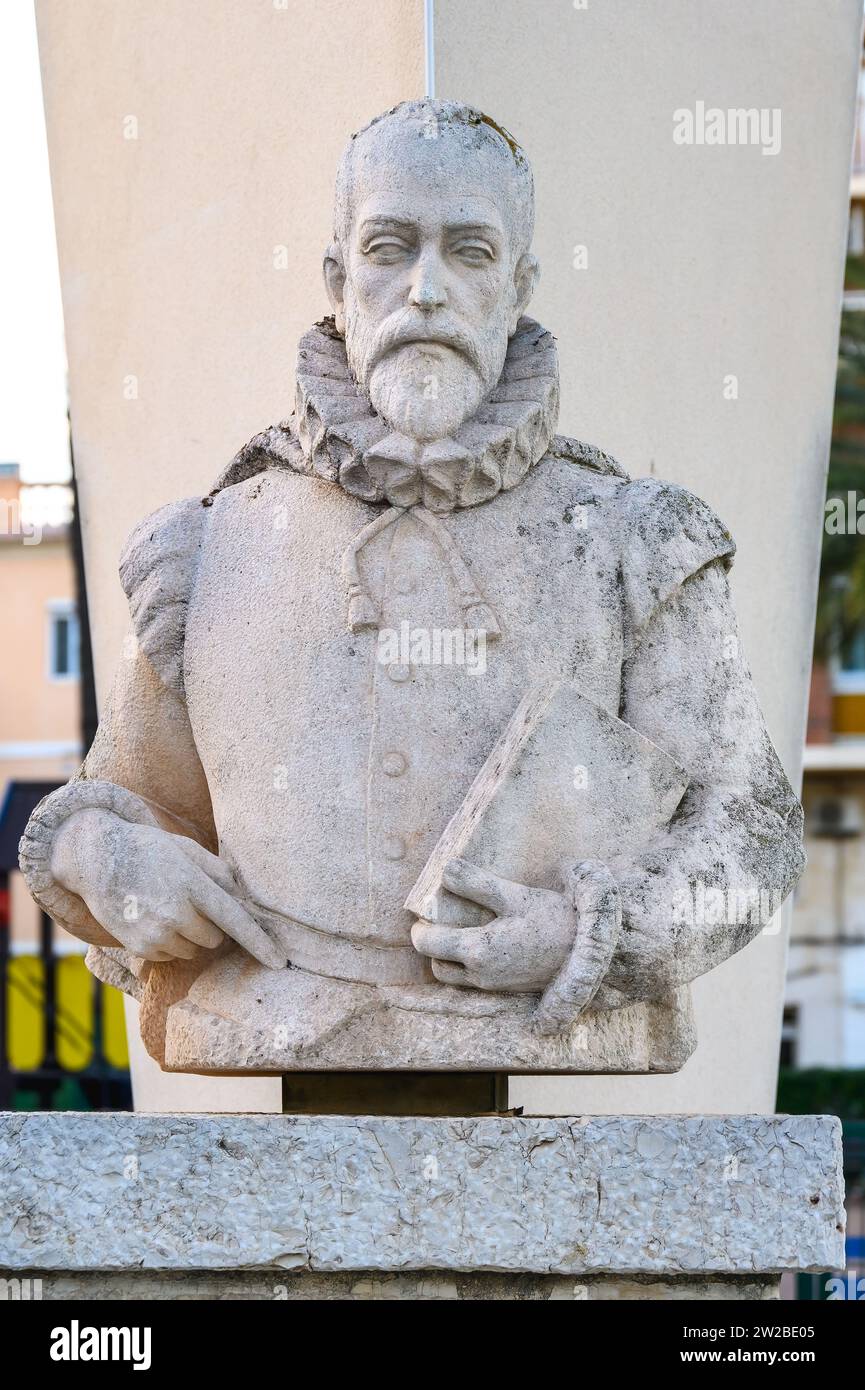 Art sculpture of Miguel de Cervantes Saavedra in Denia, Spain Stock Photo
