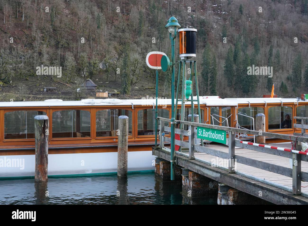 Electric excursion boat on the Königssee at the St. Bartholomä jetty on the Watzmann east face. Stock Photo