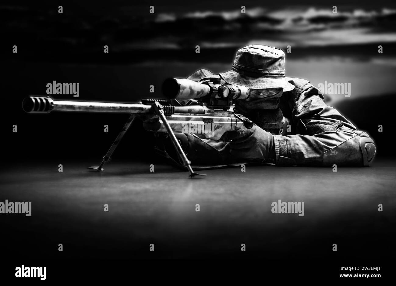 Sniper took the position and waits for the goal. Mixed media Stock Photo
