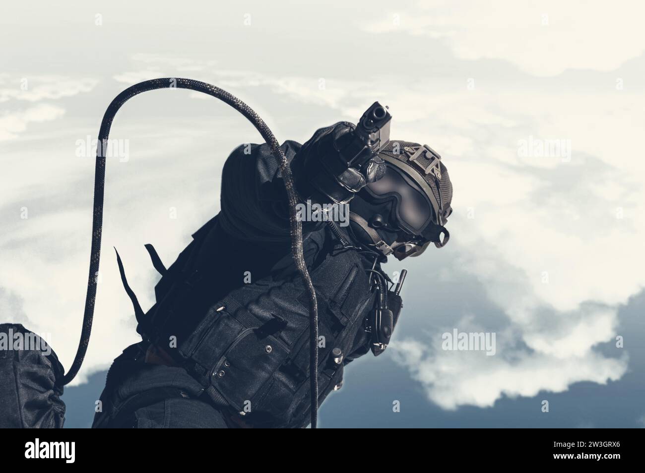 Image of a special unit soldier jumping from a helicopter. Military concept. Anti-terrorism. Mixed media Stock Photo