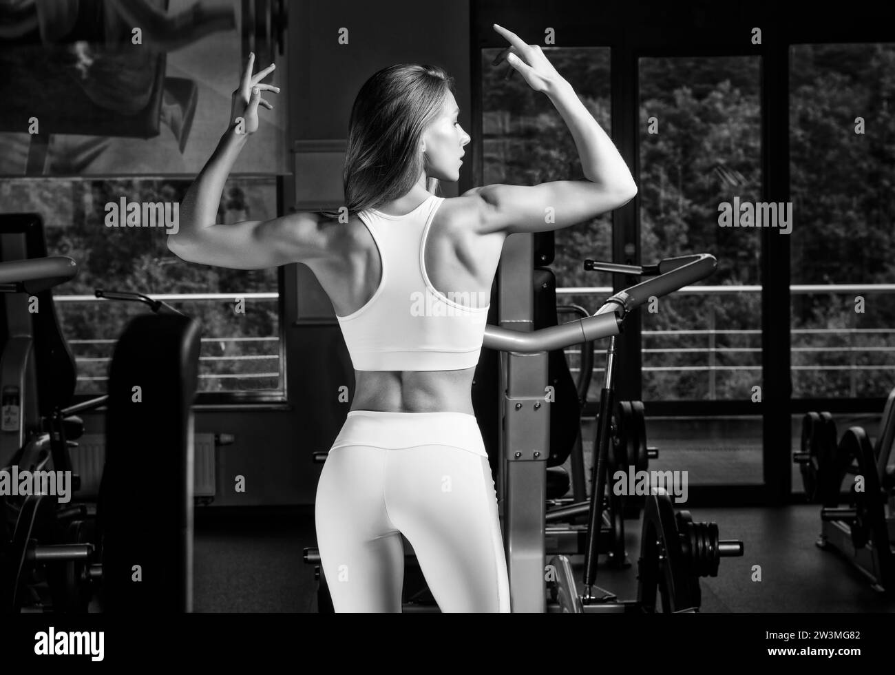 Woman weightlifting rear view Black and White Stock Photos & Images - Alamy