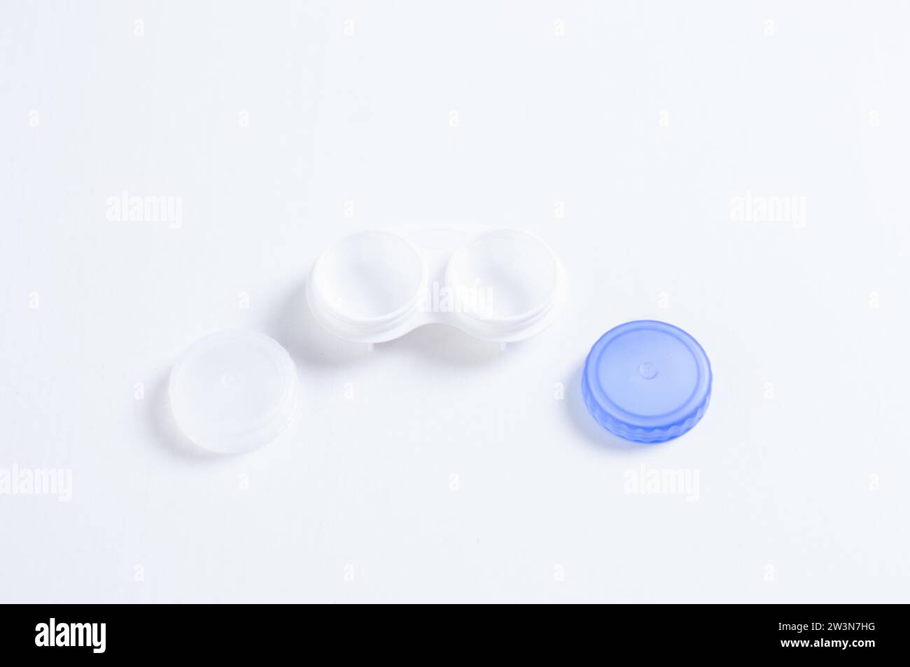 Boxes for lenses on a white background. Ophthalmology concept. Mixed