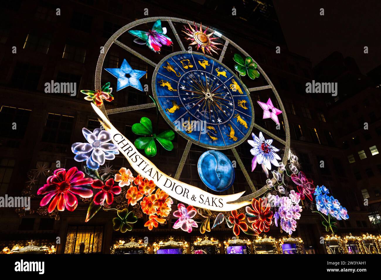 Christian Dior and Saks have displayed this Dior's Carousel of Dreams on the Saks Fifth Avenue store at night. Stock Photo