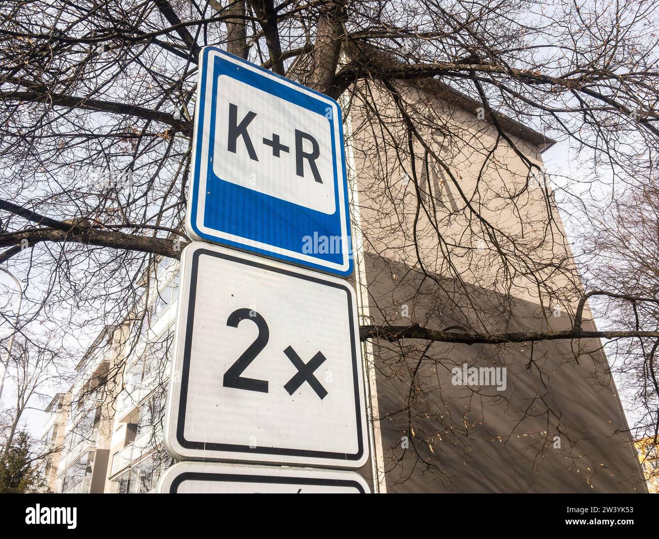 Traffic sign of K+R (kiss and ride) in front of the kindergarten and school Stock Photo