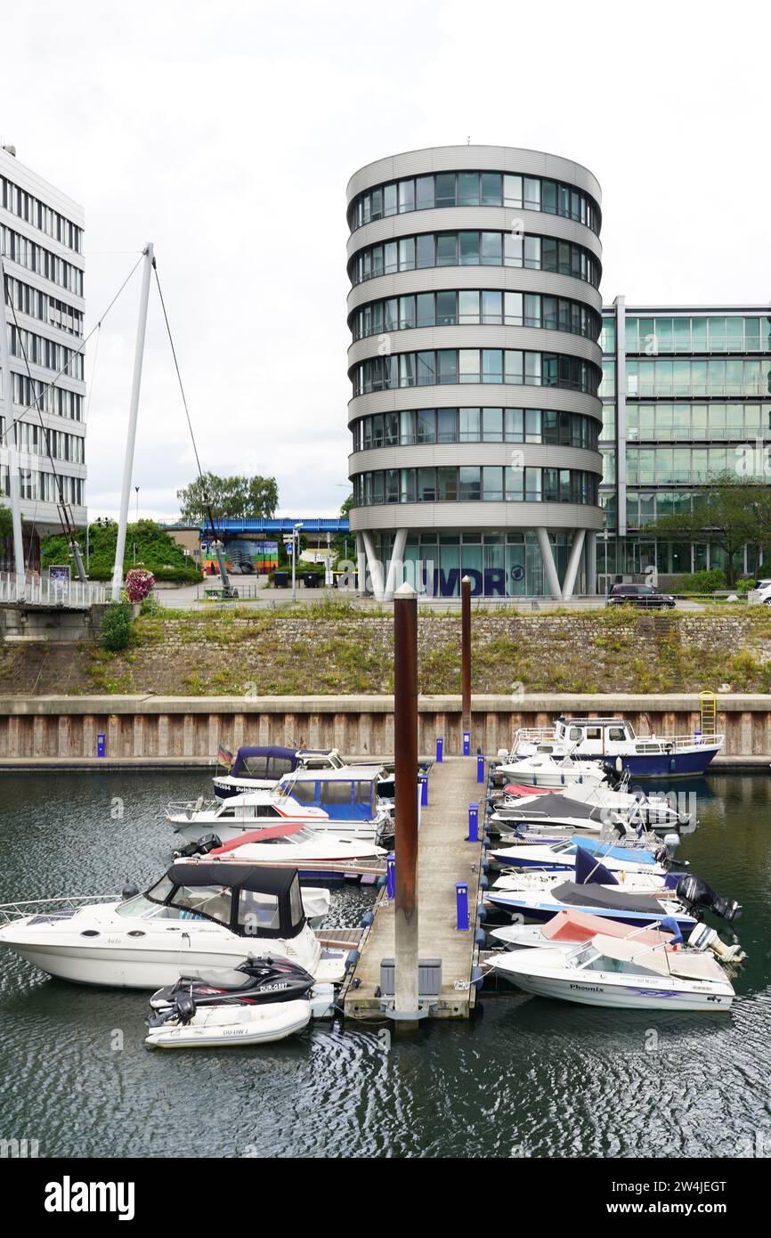 Boats in front of the WDR Studio Building Duisburg at Innenhafen Duisburg Stock Photo