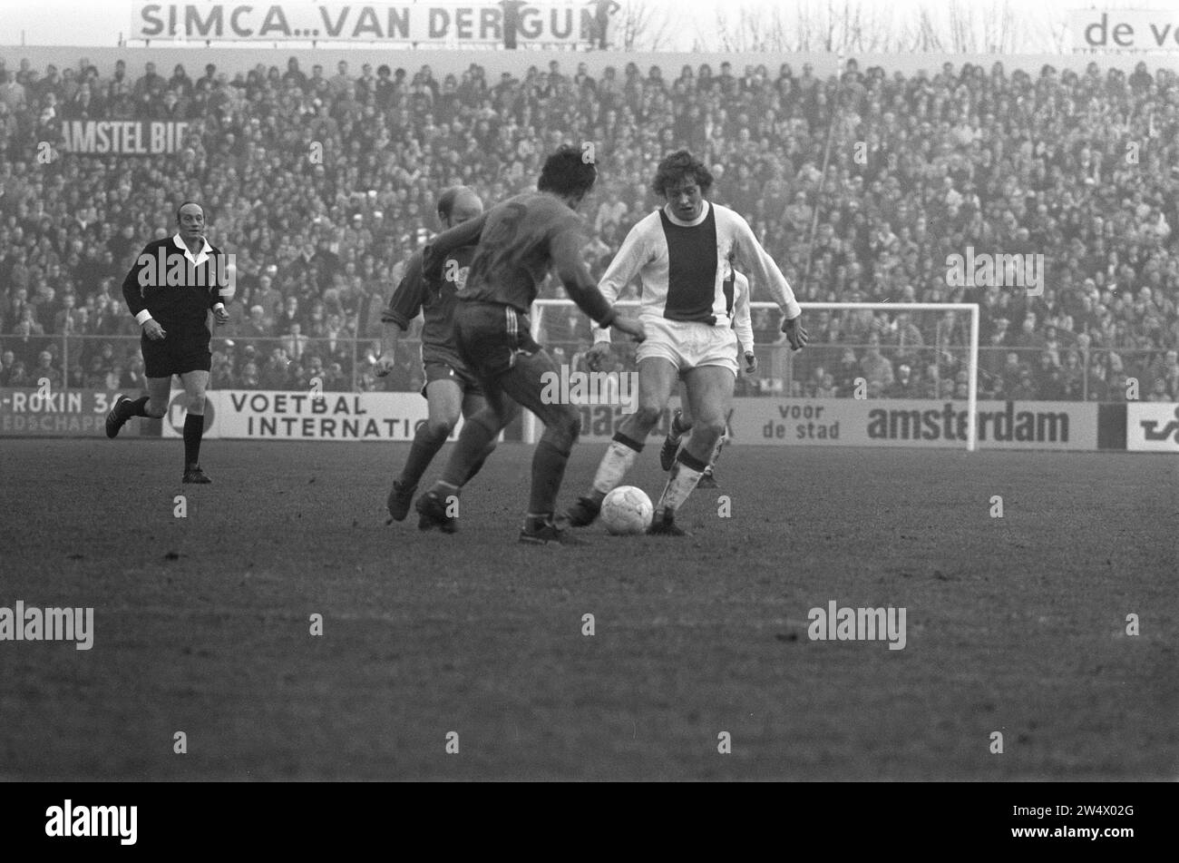 Ajax against MVV 4-0, number 17 Arie Haan (right) in action ca. December 17, 1972 Stock Photo