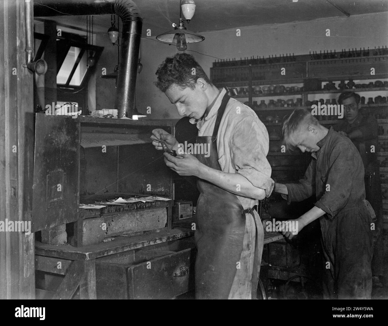 Manufacturing glasses lenses Black and White Stock Photos & Images - Alamy