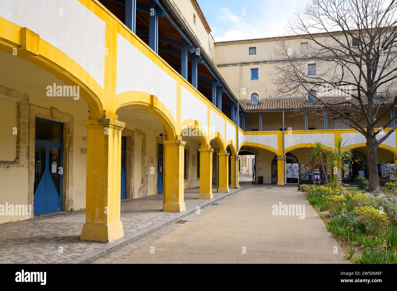 Arles, France - March 13, 2023: Courtyard of L'espace Van Gogh in Arles on a sunny day in springtime.The Espace van Gogh was originally built in the s Stock Photo