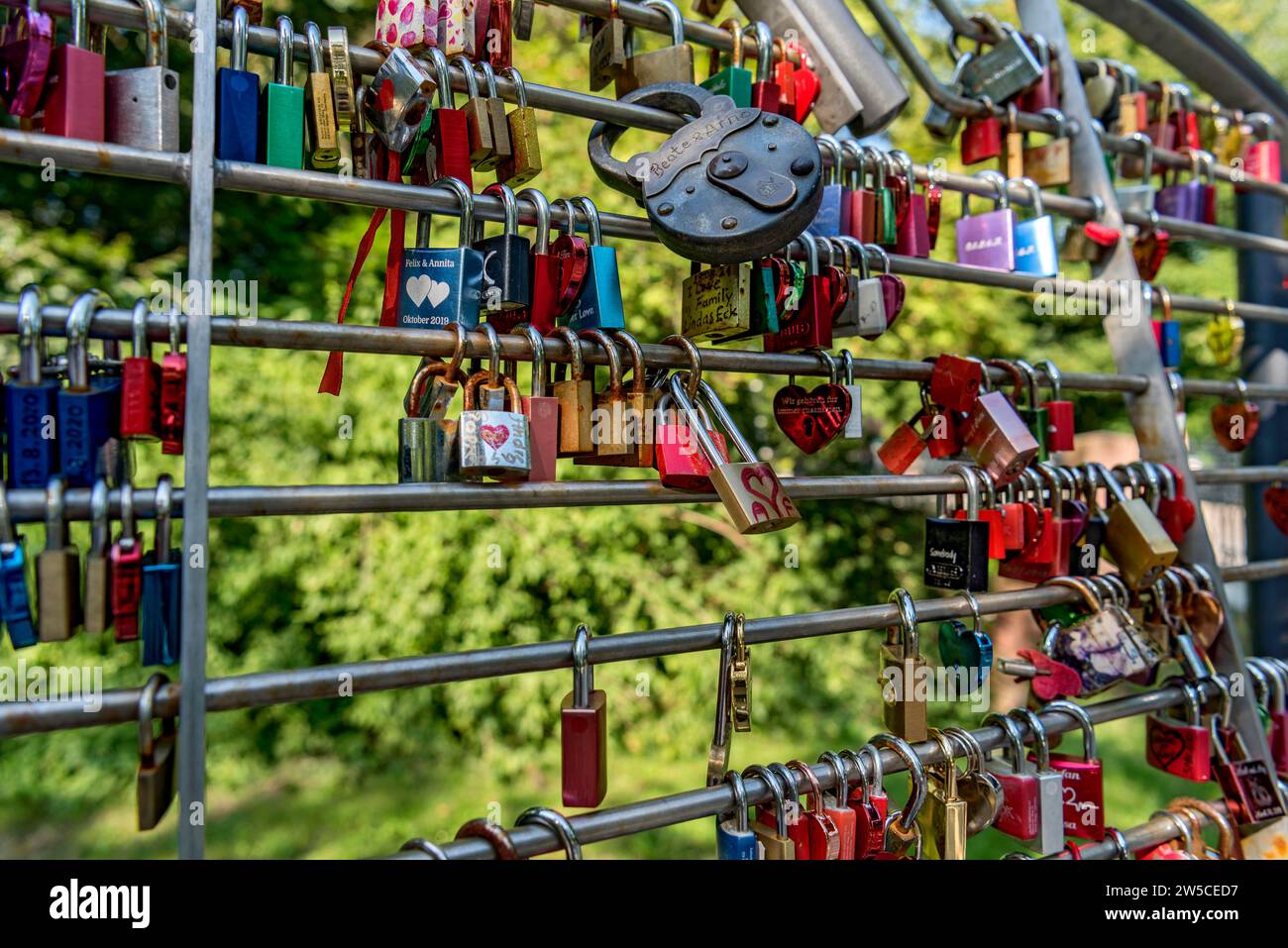 Love locks on the monument to rock singer Elvis Presley, King of Rock 'n' Roll, bridge over the River Usa, Usa Bridge, spa garden, Bad Nauheim Stock Photo