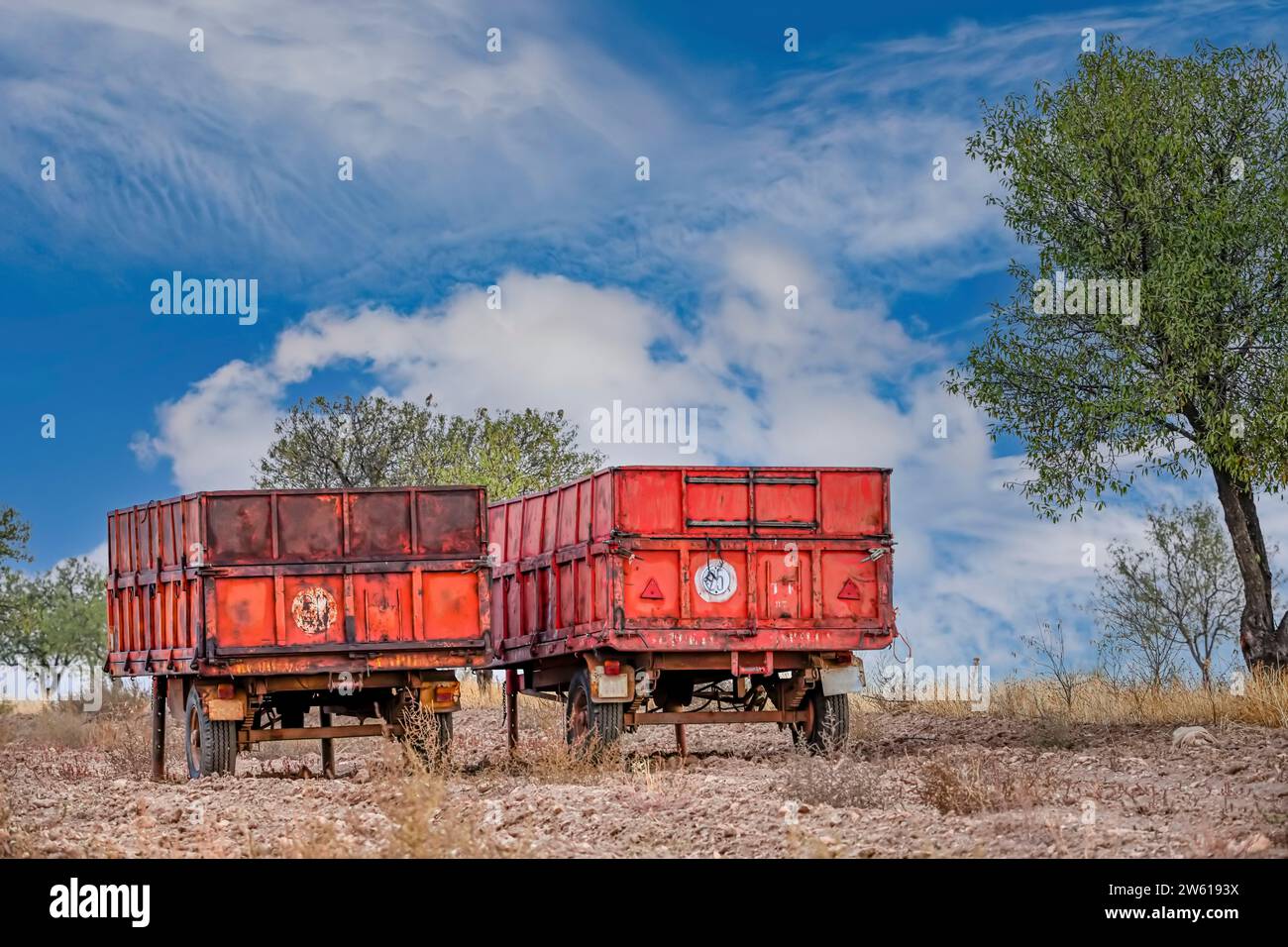 Abandoned tractor trailers in the field Stock Photo - Alamy