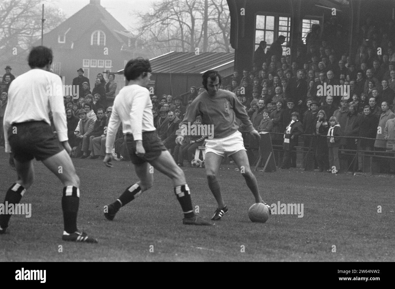 (original caption) KHFC against Old Internationals, Coen Moulijn in action ca. January 1, 1973 Stock Photo