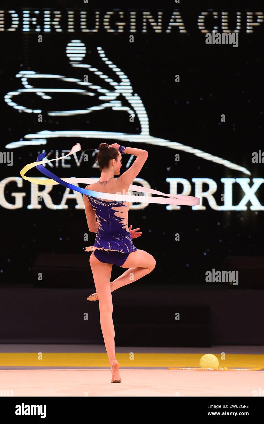 gymnast girl perform at rhythmic gymnastics competition Stock Photo