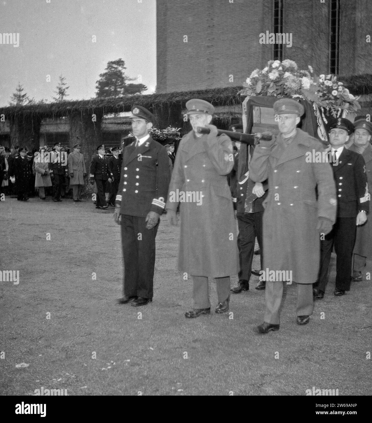 Officers of the army and navy carry the bier during a military funeral ca. undated Stock Photo