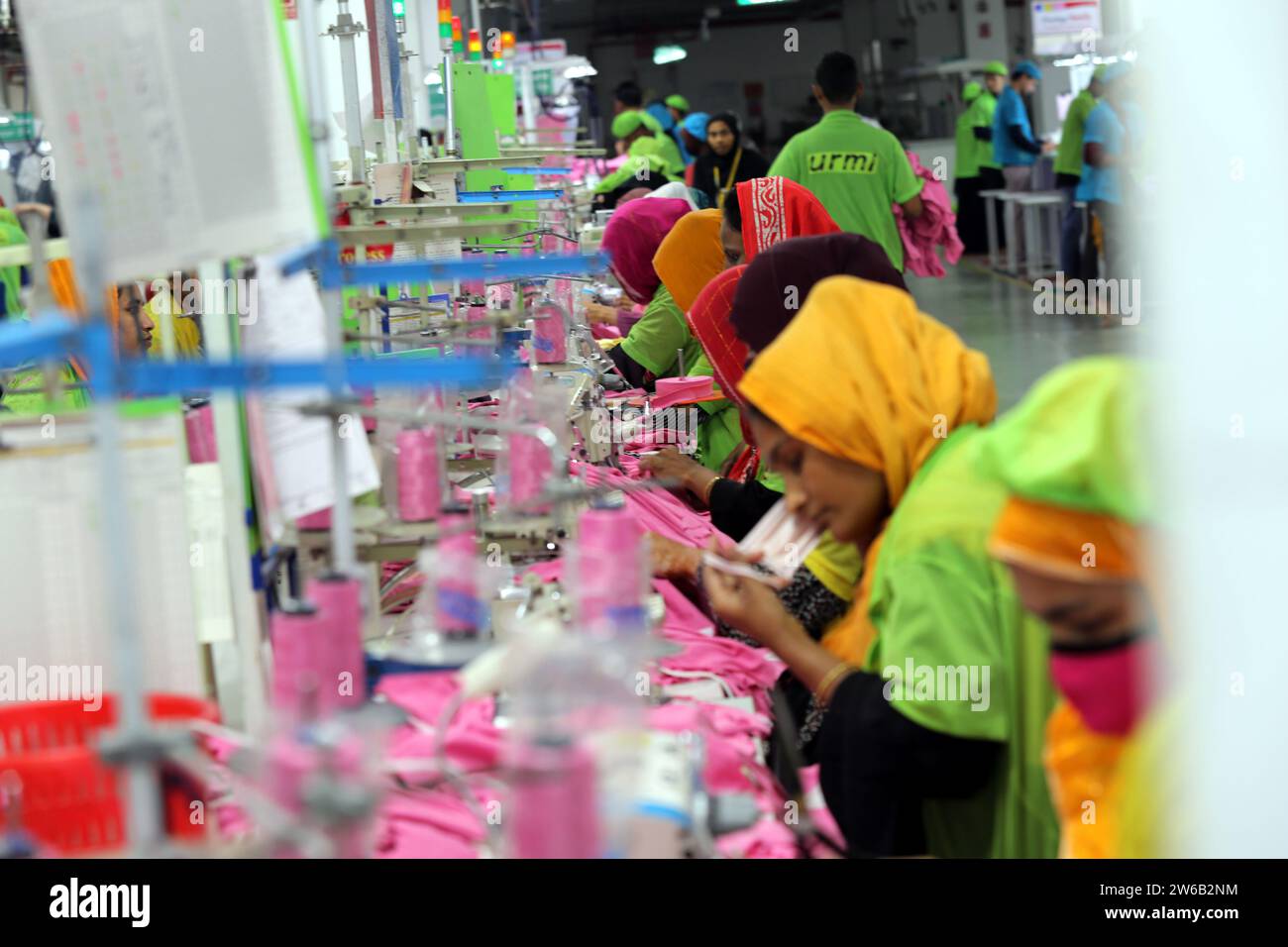 Readymade garments worker works in a garments factory in Dhaka, Bangladesh on December 21, 2023