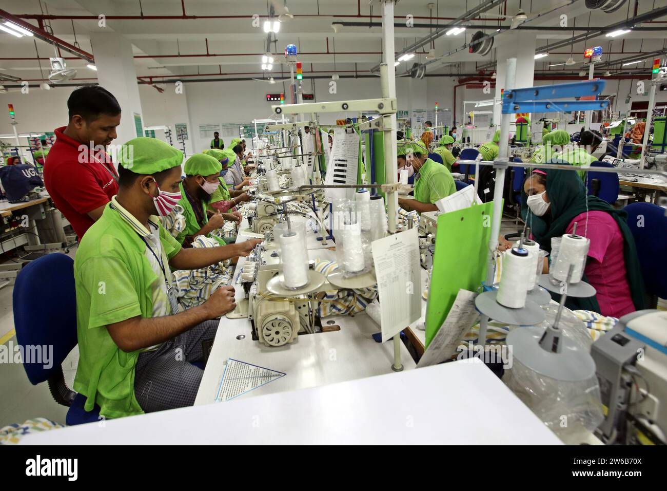 Readymade garments worker works in a garments factory in Dhaka, Bangladesh on December 21, 2023