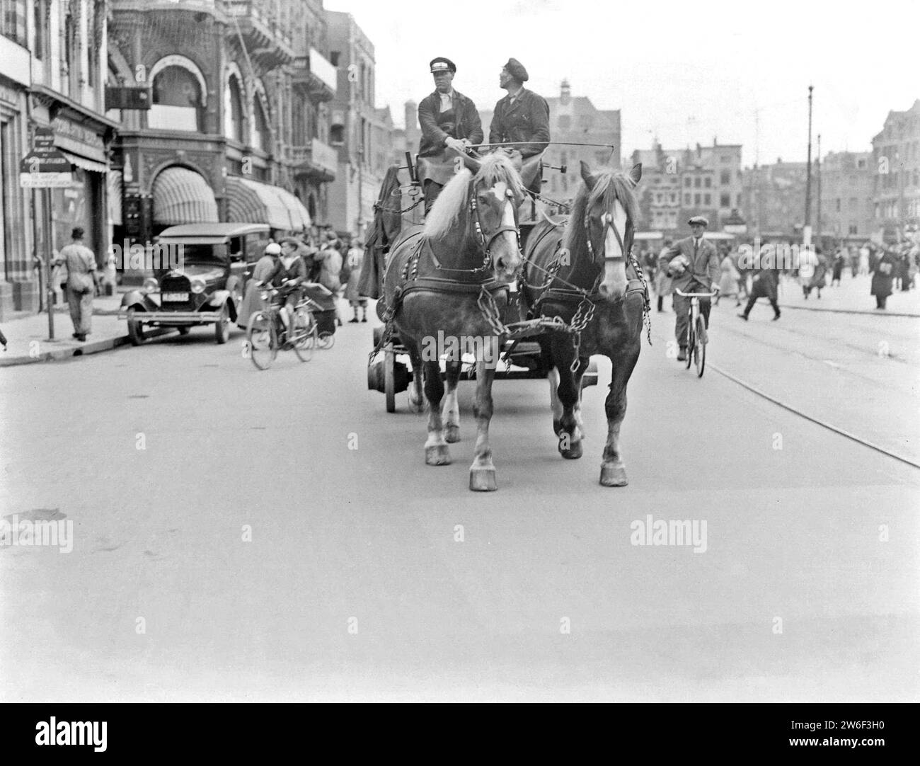 Two horses in front of the Heineken beer wagon on the Rokin ca. undated Stock Photo