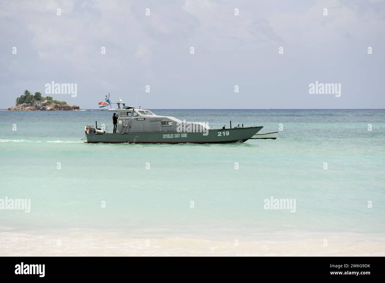 Seychelles coast guard boat patrolling the sea at Cote D'Or Beach, Anse