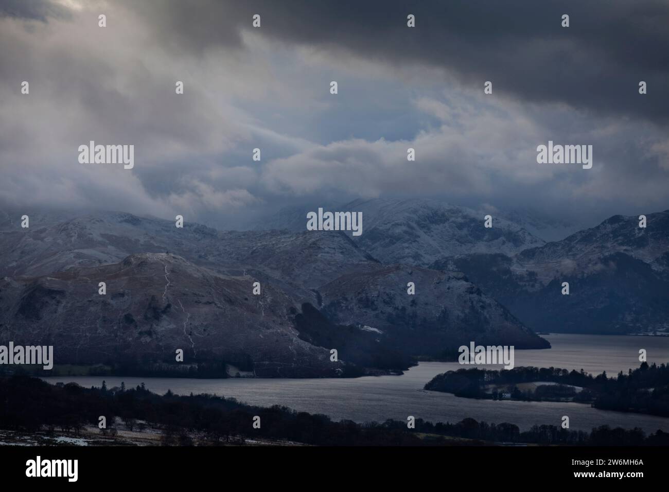 Dark stormy skies over Ullswater seen from Heaghscar Hill, in the English Lake District Stock Photo