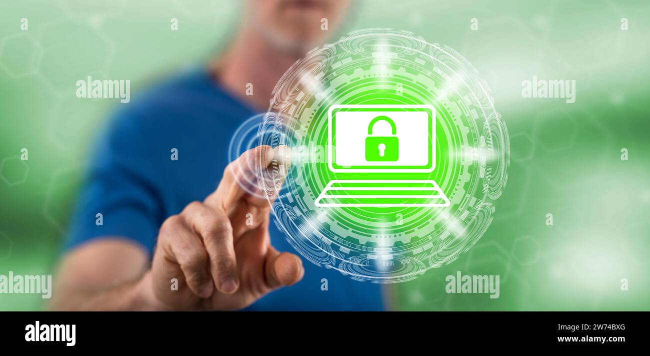 Man touching a cyber security concept on a touch screen with his finger Stock Photo