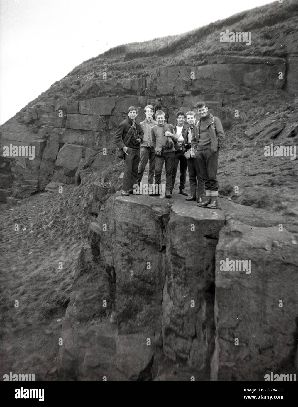 Outpost England 1960s, historical, a father with sons and their friends standing on a ...