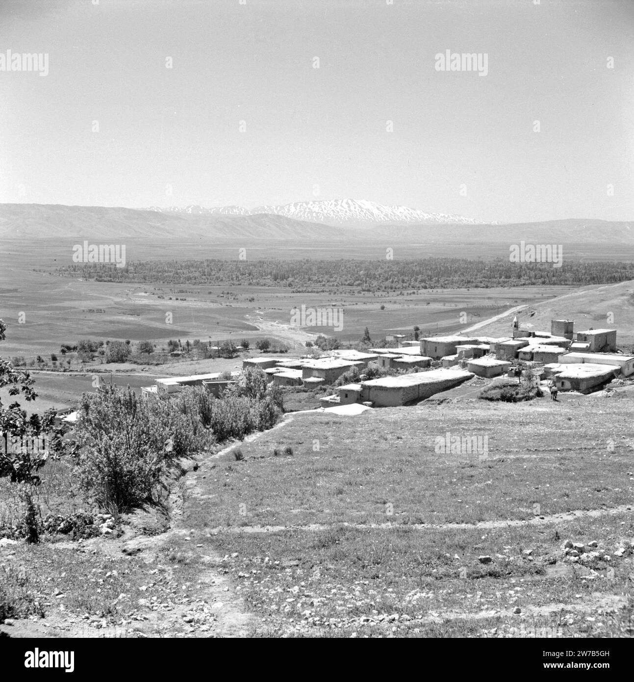View of a village in the Bekaa Valley of Lebanon. Mount Hermon on the
