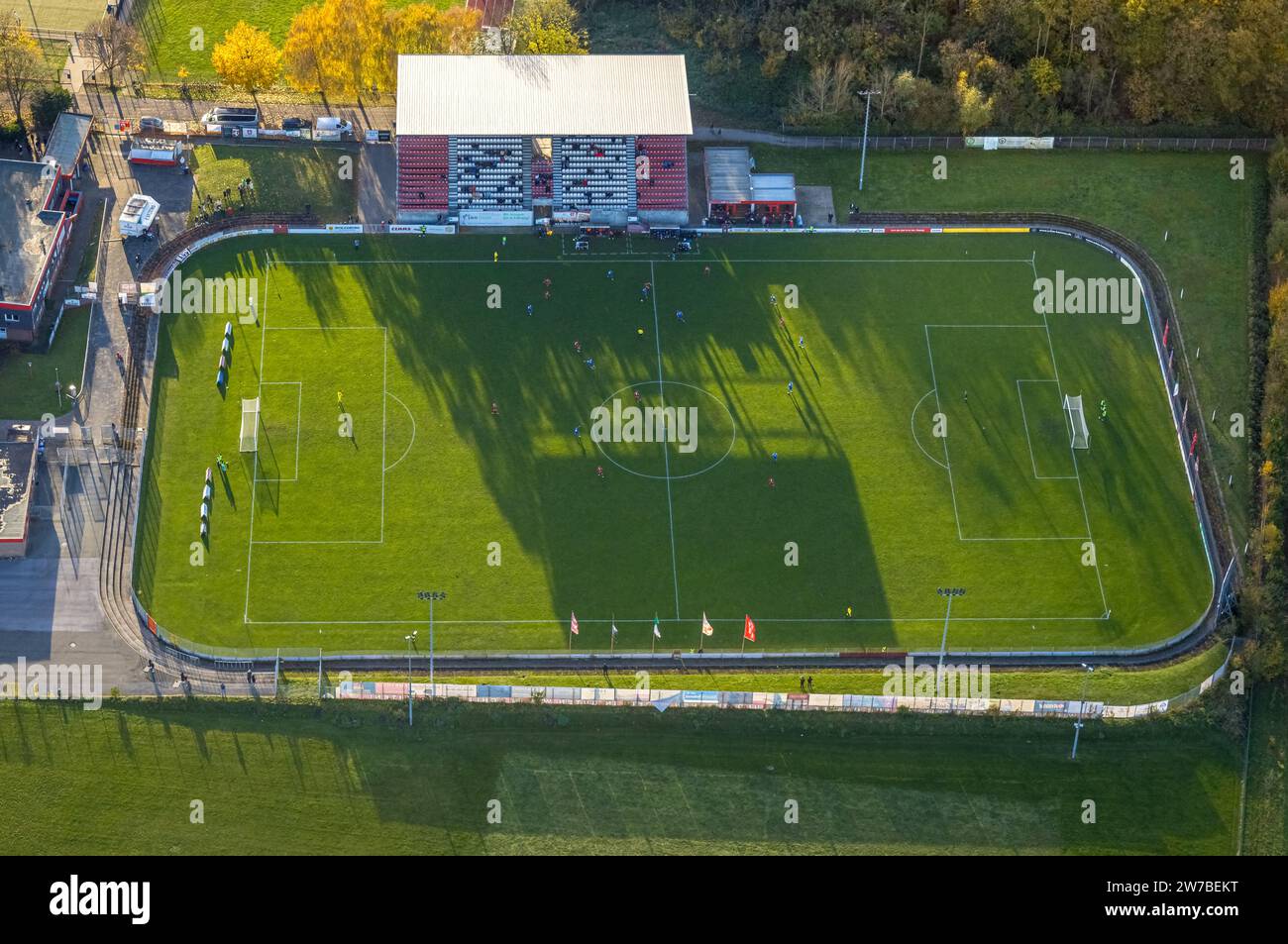Aerial view, Betten Kutz Stadium soccer pitch with grandstand in the sports center east, surrounded by autumnal deciduous trees, center, Hamm, Ruhr ar Stock Photo