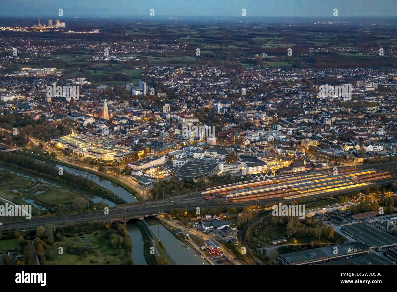 Aerial view, night view, central station and city with Allee Center and distant view, center, Hamm, Ruhr area, North Rhine-Westphalia, Germany, Allee- Stock Photo