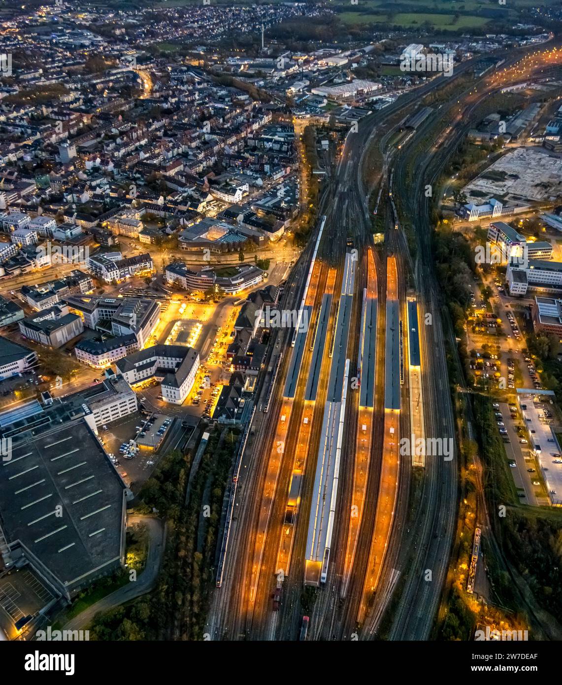Aerial view, night shot, central station with station forecourt and city view, center, Hamm, Ruhr area, North Rhine-Westphalia, Germany, Architektur, Stock Photo