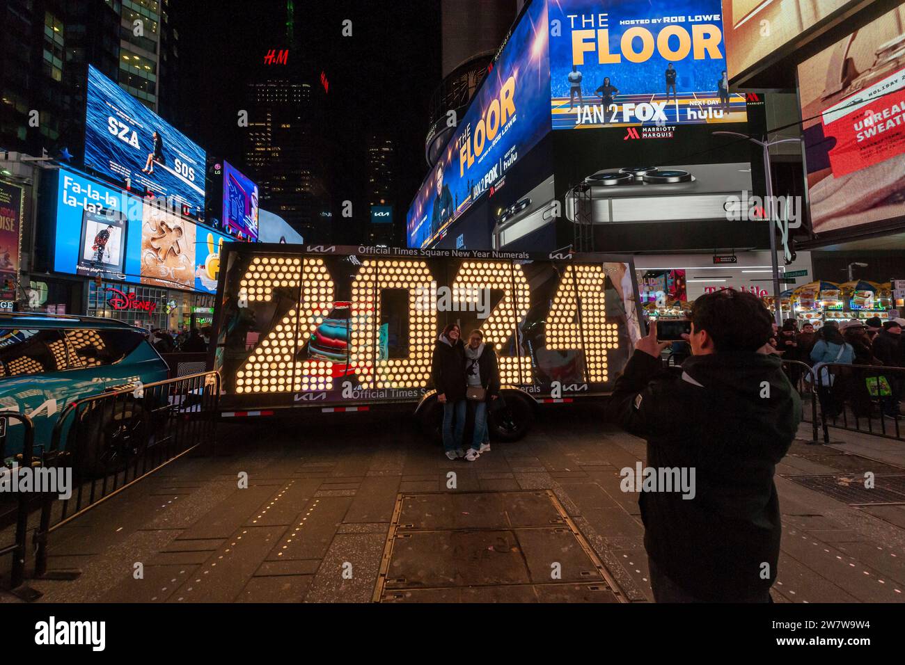 Visitors to Times Square in New York flock to the temporary display of