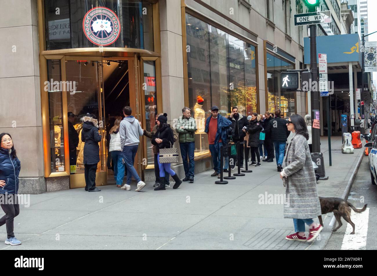 Line to enter the Canada Goose store during the last car-free Fifth Avenue in Midtown Manhattan during the Holiday Open Streets on Sunday, December 17, 2023. New York City closed a nine-block stretch of Fifth Avenue in Midtown to vehicles on Sundays in December creating a holiday block party for visitors. (© Richard B. Levine) Stock Photo