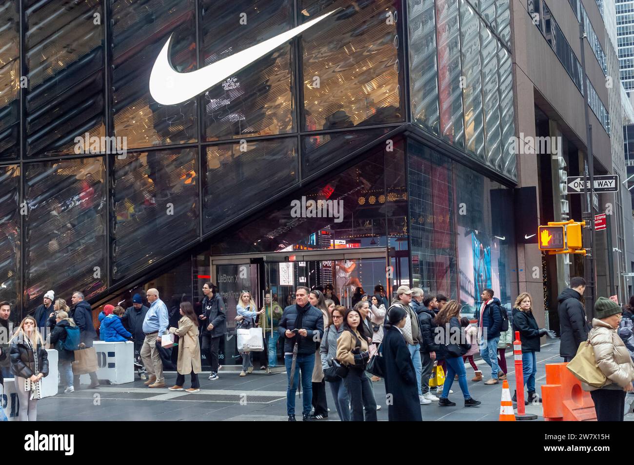 Nike store during the last car-free Fifth Avenue in Midtown Manhattan during the Holiday Open Streets on Sunday, December 17, 2023. New York City closed a nine-block stretch of Fifth Avenue in Midtown to vehicles on Sundays in December creating a holiday block party for visitors. (© Richard B. Levine) Stock Photo