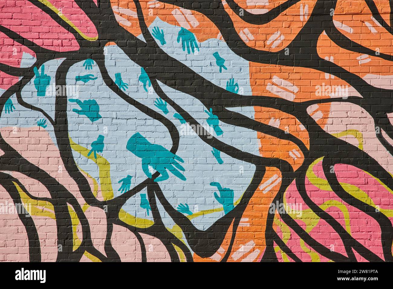 Colorful Urban Mural with Hands and Branches on Brick Wall Stock Photo ...