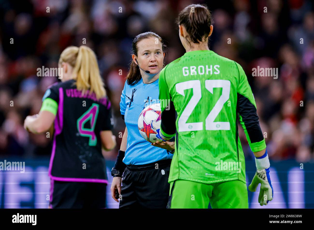 AMSTERDAM, NIEDERLANDE - DECEMBER 20: referee Cheryl Foster and Maria Luisa Grohs (FC Bayern Munchen) speaks with during the training Group C - UEFA W Stock Photo