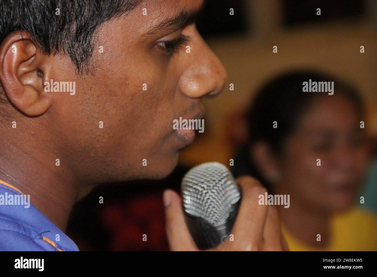 Maldives - October 4, 2013 : Home Karaoke entrainment between friends with Asian ethnicity Stock Photo
