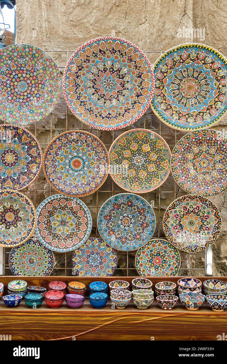 Colourful traditional mosaic painted plates and bowls tourist souvenirs