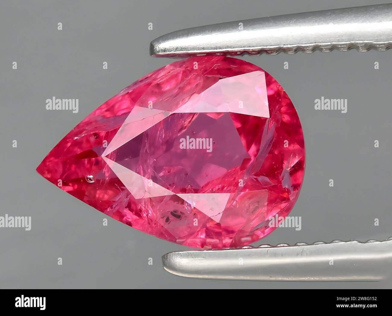 natural pink spinel gem on background Stock Photo