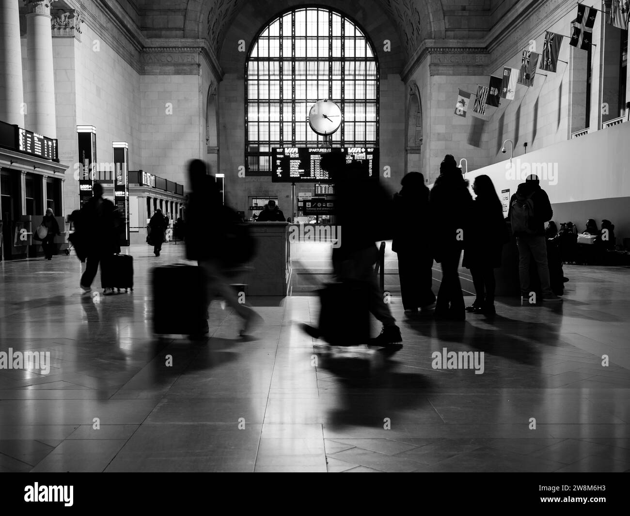 Commuters scramble to catch their train inside Union Station in Toronto