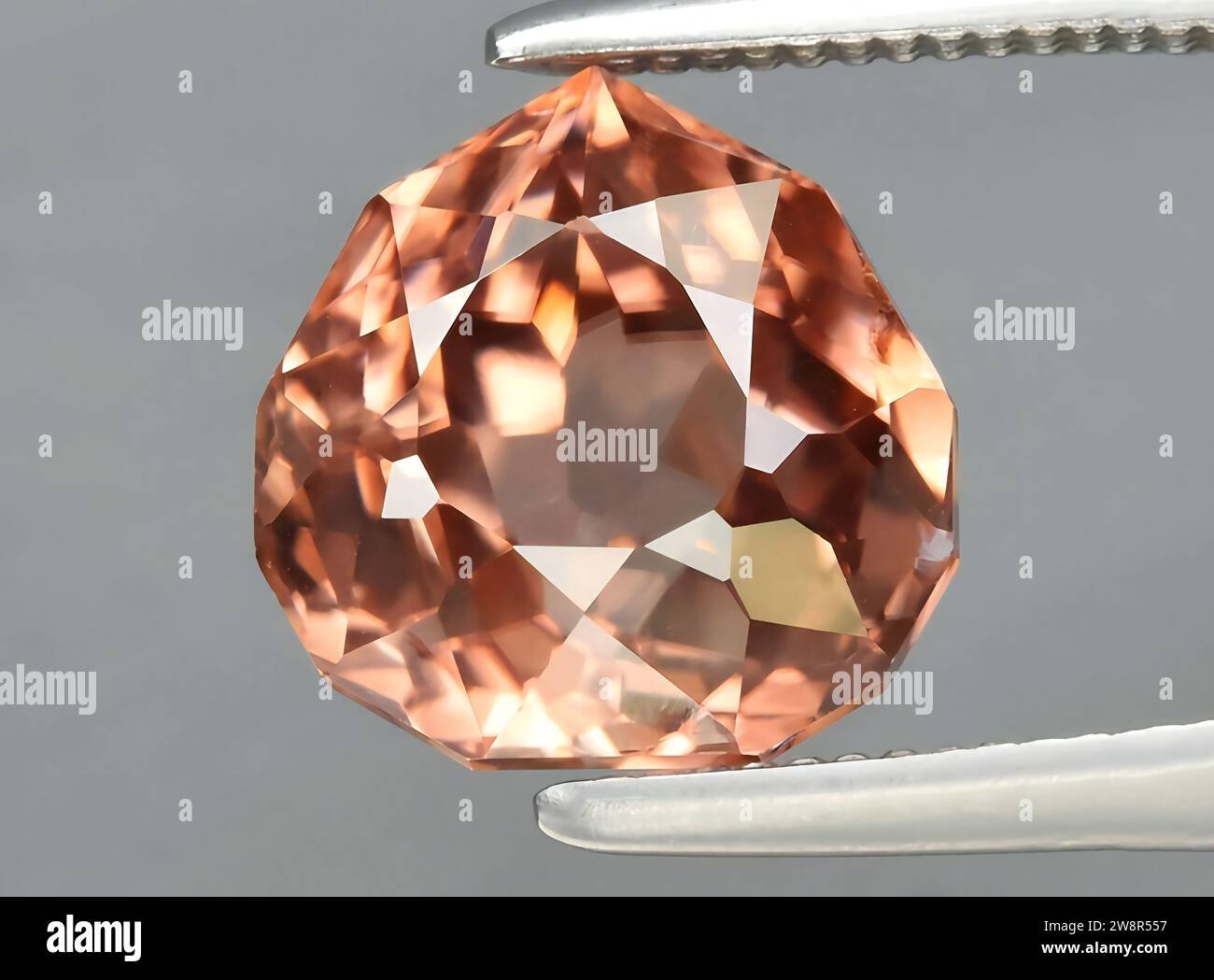 natural brown zircon gem on background Stock Photo