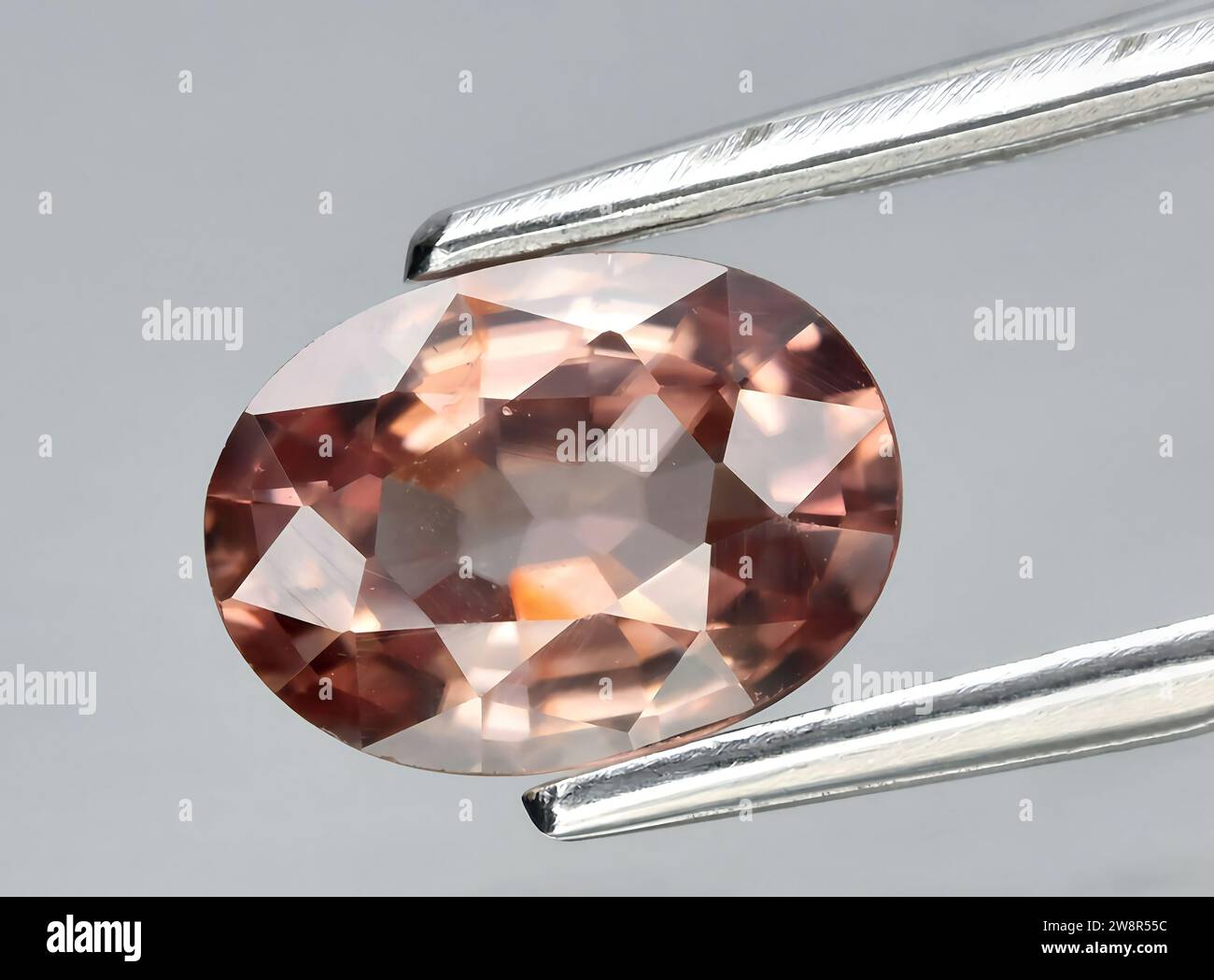 natural brown zircon gem on background Stock Photo